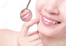 Woman smiling with dental veneer
