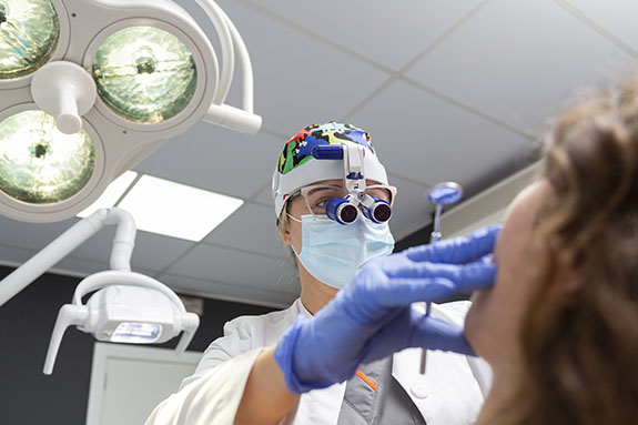 Dentist working on a patient in dental clinic